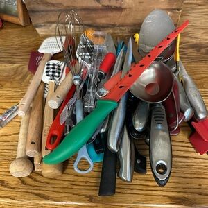 Red and Green Kitchen Utensil Organizer with Variety and Material Mix